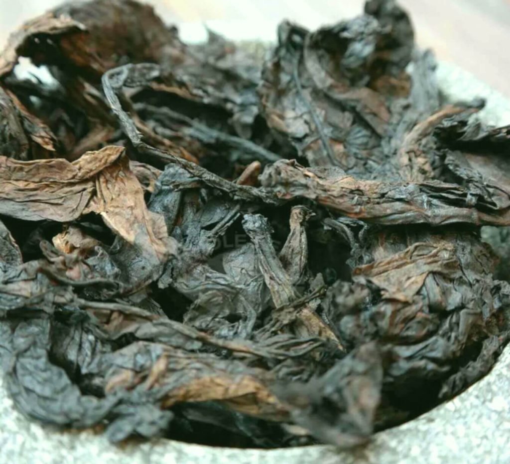 Bundle of dried Mediterranean tobacco leaves, ready for the blending process.